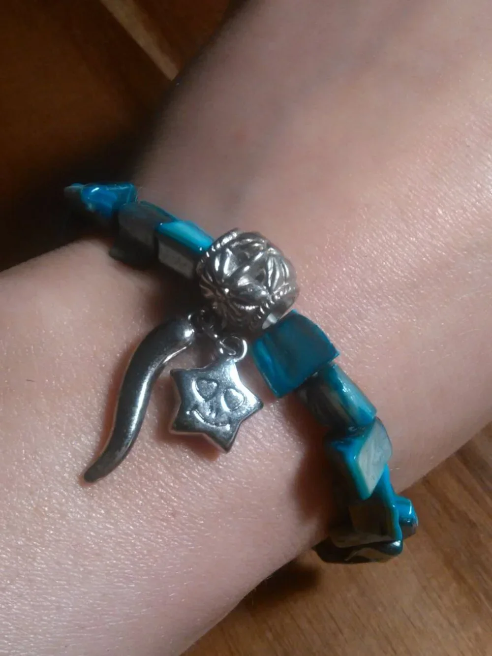 Blue Shell and Silvertone Star Charm Stretch Bracelet